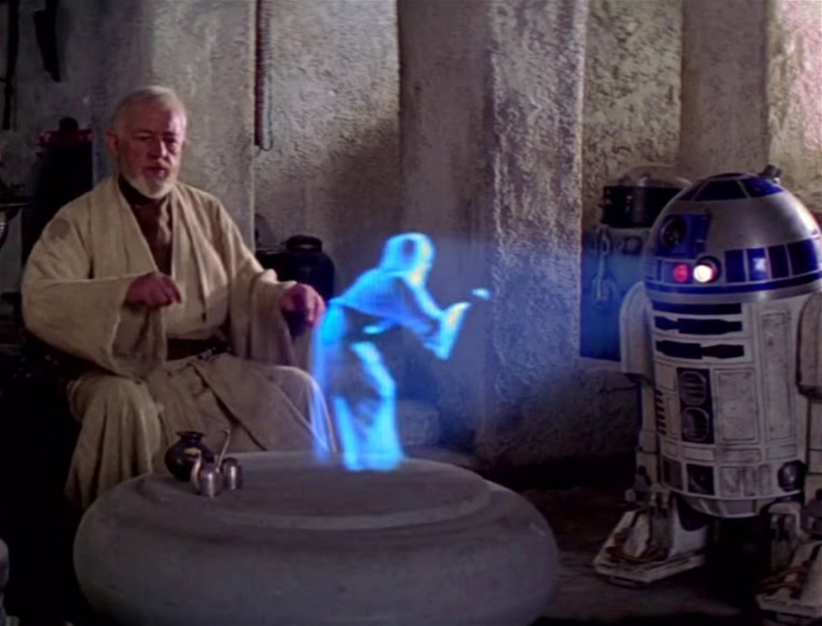 R2-D2 proietta l'ologramma della Principessa Leia in una scena di Star Was Episodio IV - Una nuova speranza