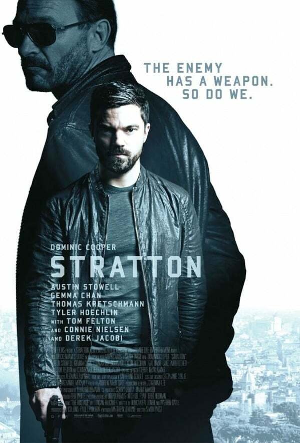 Dominic Cooper in posa con la pistola in Stratton