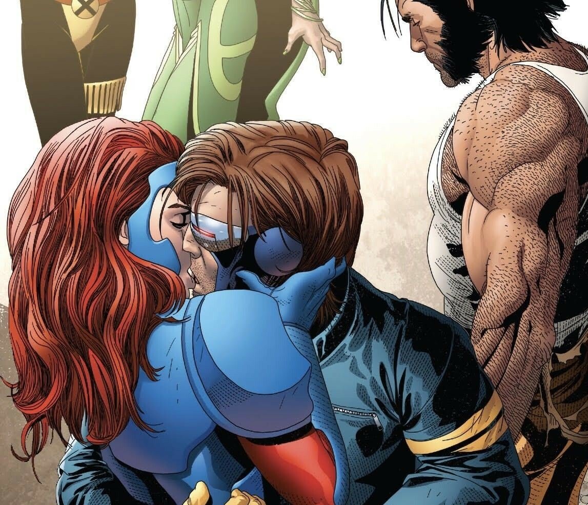 Fenice e Ciclope si baciano, sullo sfondo Wolverine malinconico