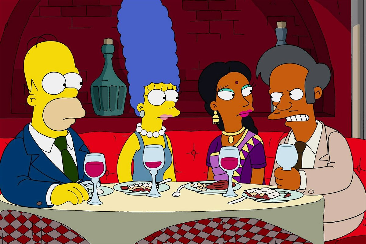 Homer e Marge a cena con Apu e consorte