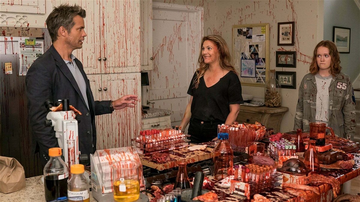 Joel, Sheila ed Abby in una cucina piena di sangue