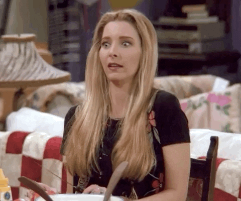 Phoebe della serie TV Friends che fa spallucce