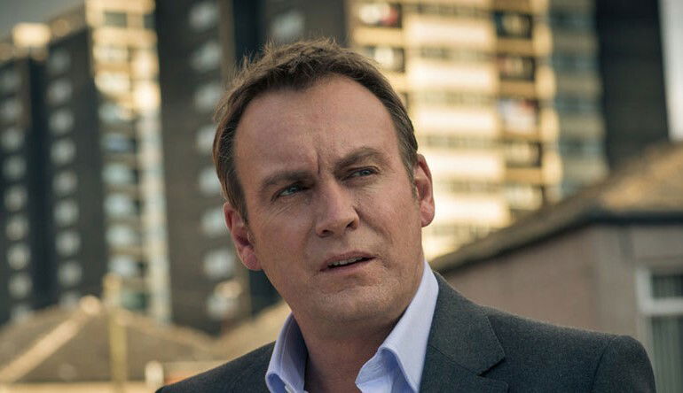 Clicca per vedere l'immagine originale Outcast: il reverendo Anderson