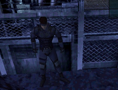 Solid Snake attende con le spalle al muro di agire