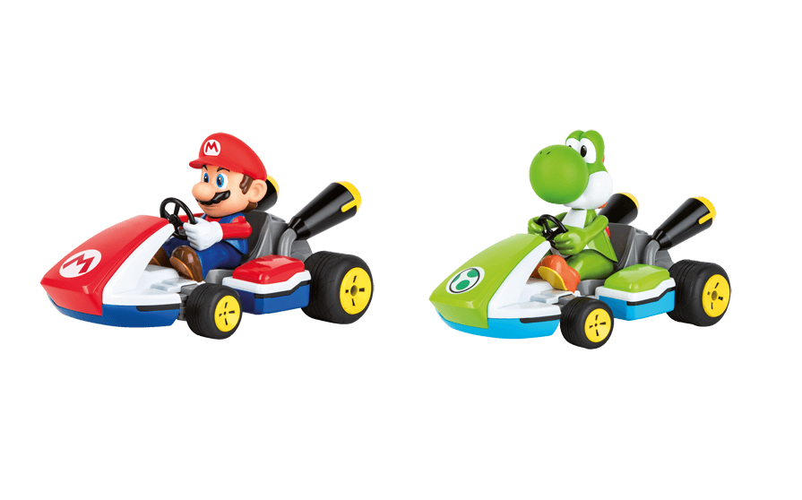 Super Mario e Yoshi sfrecciano sui loro kart Carrera