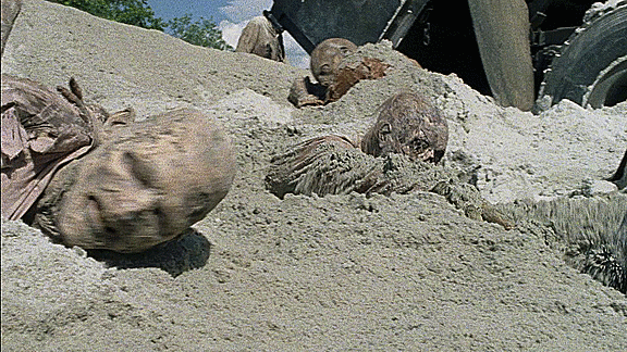 Zombie emergono dalla sabbia - GIF