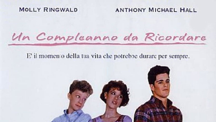 Molly Ringwald fra Anthony Michael Hall e Michael Schoeffling nella locandina italiana