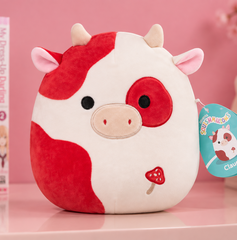 Copertina di Squishmallows Claudio sotto i 13€, la mucca maculata al minimo storico