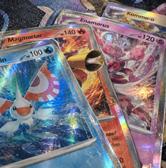 Copertina di GCC Pokémon: Masquerain, Magmortar, Enamorus e Kommo-o sono le promo di Dominio Delta