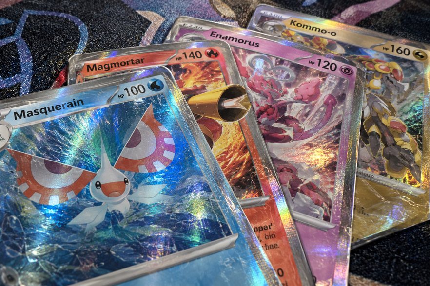GCC Pokémon: Masquerain, Magmortar, Enamorus e Kommo-o sono le promo di Dominio Delta