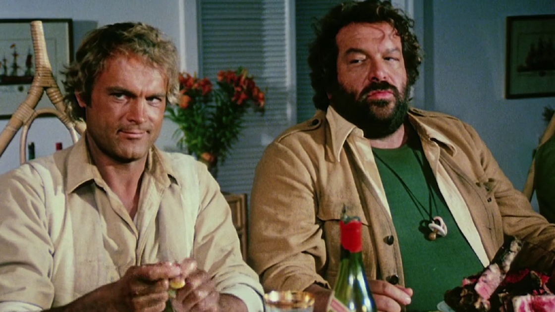 Copertina di Io sto con gli ippopotami: 10 curiosità sul film con Bud Spencer e Terence Hill (e la sua abbuffata!)